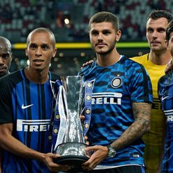 Mauro Icardi of FC Internazionale leads his team-mates to celebrate with the Champions Trophy after they defeated Chelsea FC 2-1 during the International Champions Cup match between FC Internazionale and Chelsea FC at National Stadium on July 29, 2017 in Singapore.