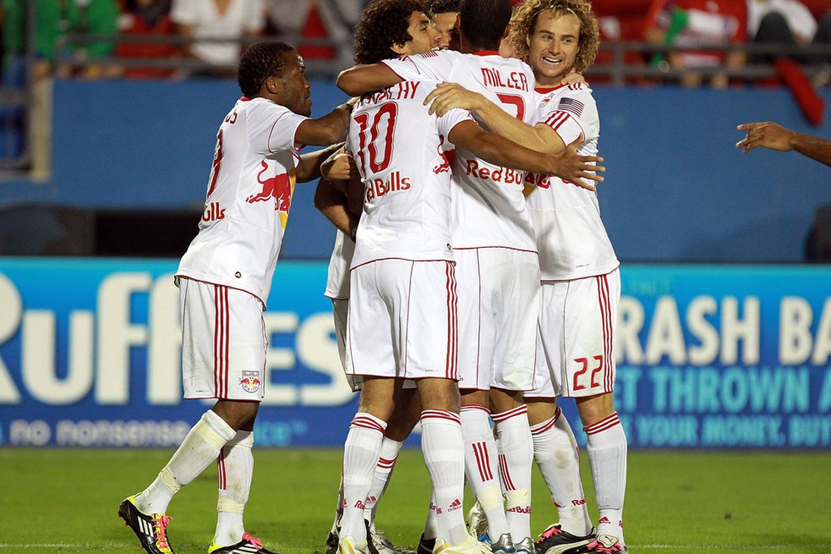 FRISCO, TX - OCTOBER 26: The New York Red Bulls celebrate a goal by Joel Lindpere #20 against FC Dallas during a wild card match at Pizza Hut Park on October 26, 2011 in Frisco, Texas.  (Photo by Ronald Martinez/Getty Images)