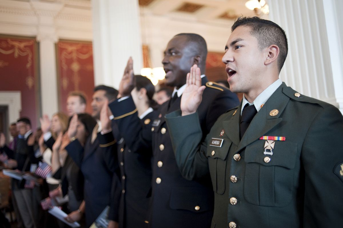 A naturalization service — prominently featuring soldiers — at the Library of Congress, 2013. 