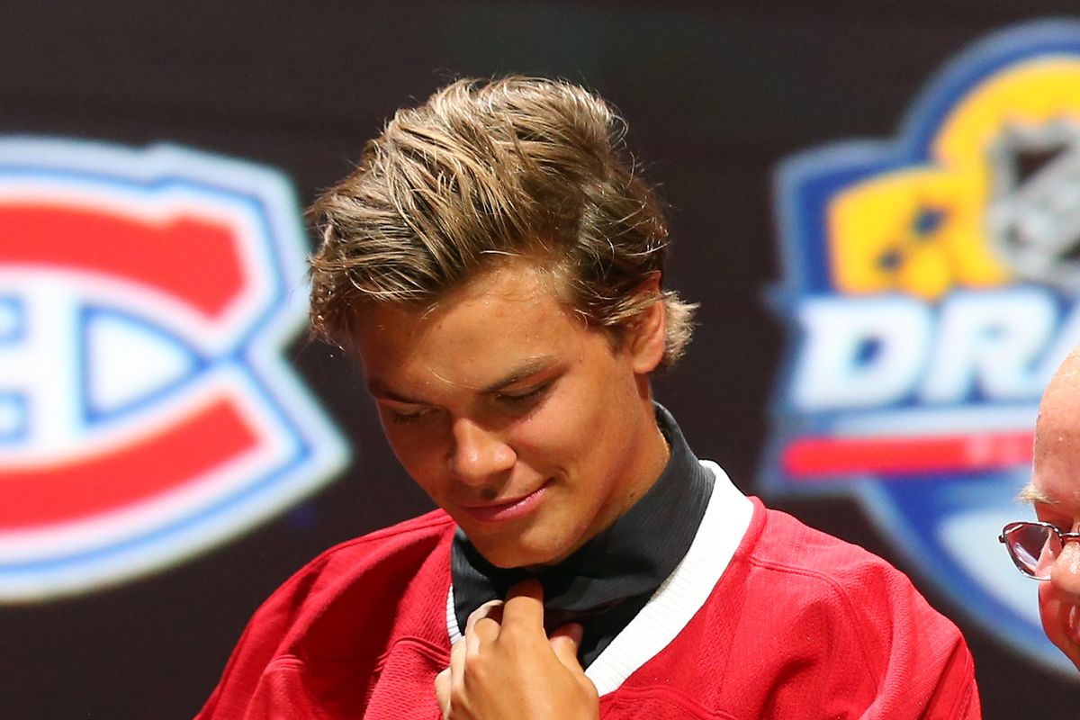 SUNRISE, FL - JUNE 26: Noah Juulsen poses after being selected 26th overall by the Montreal Canadiens in the first round of the 2015 NHL Draft at BB&T Center on June 26, 2015 in Sunrise, Florida. (Photo by Bruce Bennett/Getty Images)