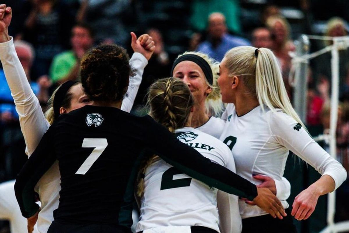 The Utah Valley women's volleyball team celebrates together during its final regular season match against CSU Bakersfield on Nov. 12, 2016. The Wolverines enter this weekend's WAC Tournament as the No. 2 seed and open play in the semifinal round on Friday