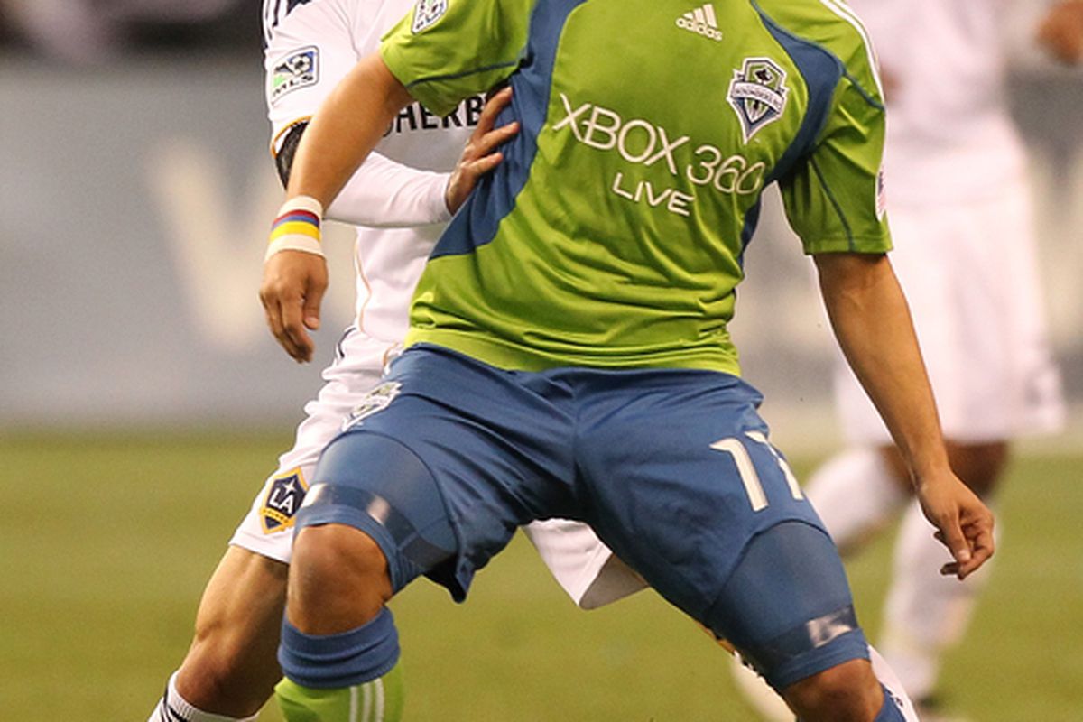 How Fredy Montero deals with Dema Kovalenko is much more important than whether or not history is on the Sounders' side. (Photo by Otto Greule Jr/Getty Images)