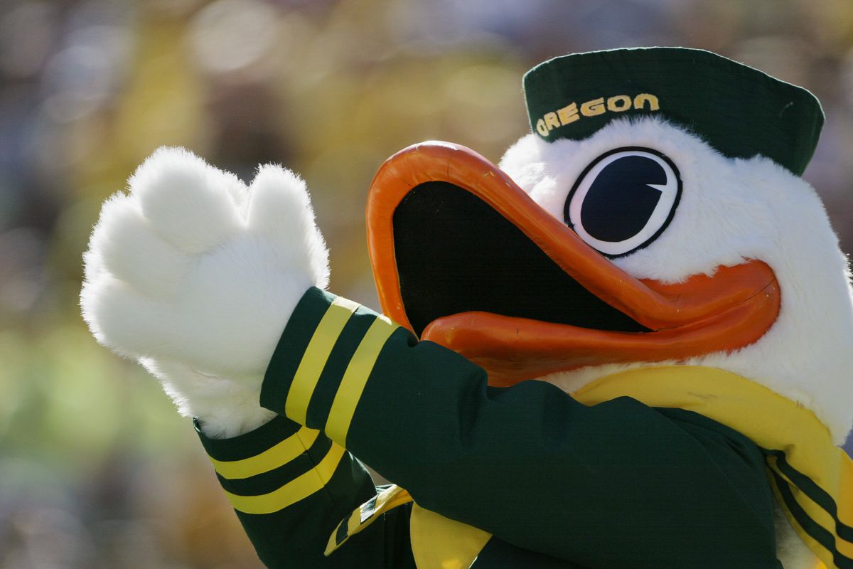 The Oregon Ducks mascot claps