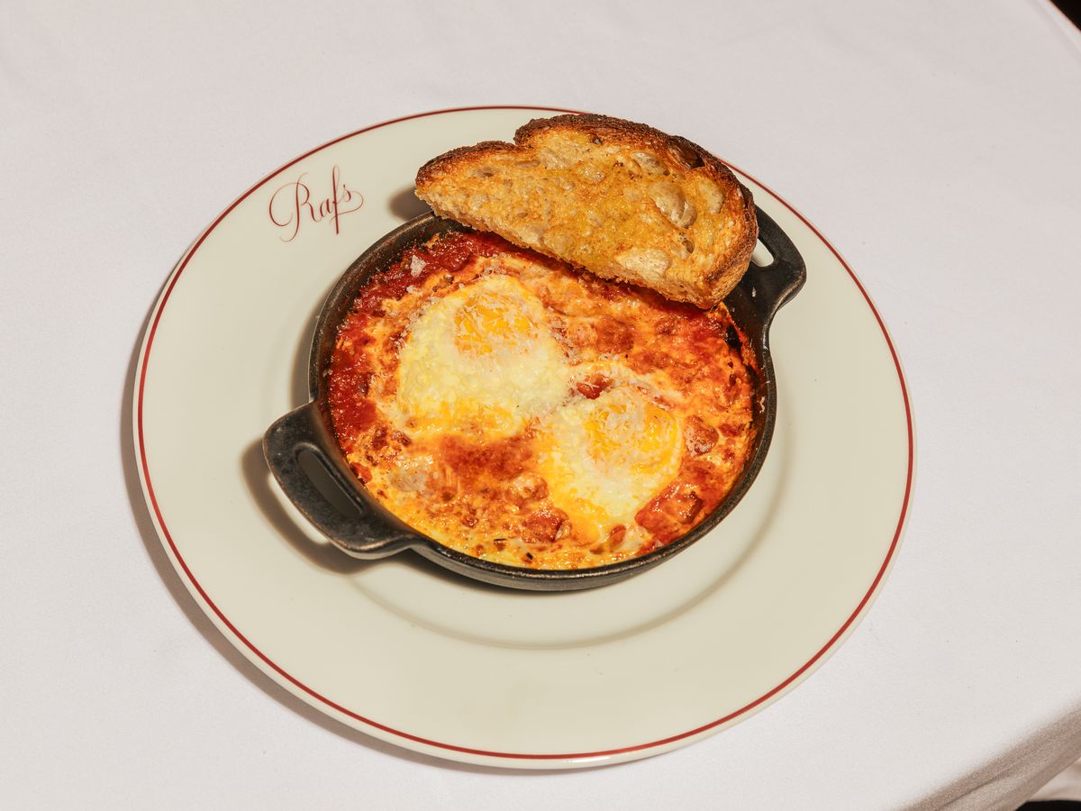An egg baked in tomato sauce. 