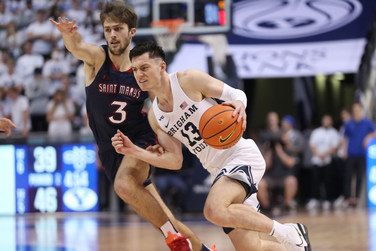 Brigham Young Cougars guard Alex Barcello (13) drives on Saint Mary’s Gaels guard Augustas Marciulionis (3).