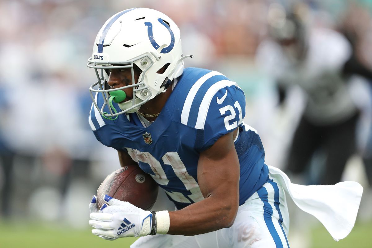 Nyheim Hines #21 of the Indianapolis Colts runs the ball during the second half against the Jacksonville Jaguars at TIAA Bank Field on September 18, 2022 in Jacksonville, Florida.