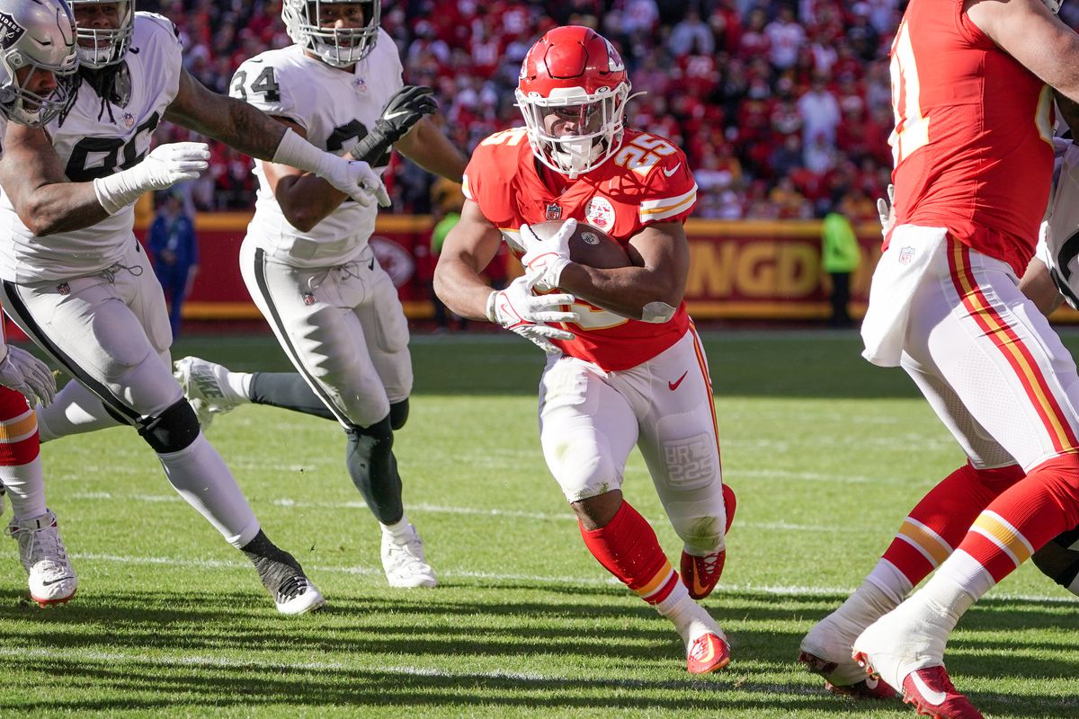 Kansas City Chiefs running back Clyde Edwards-Helaire (25) runs in for a touchdown against the Las Vegas Raiders during the first half at GEHA Field at Arrowhead Stadium.