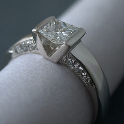 .50ct princess cut diamond set in white gold, ~$3K by <a href="http://tntrental.com/jg1/jg1/JEN/">Jen Green Custom Jewelry</a>.