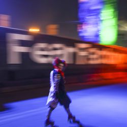Taylor Morgan roller skates in her costume as she works at Fear Factory in Salt Lake City on Tuesday, Oct. 16, 2018.