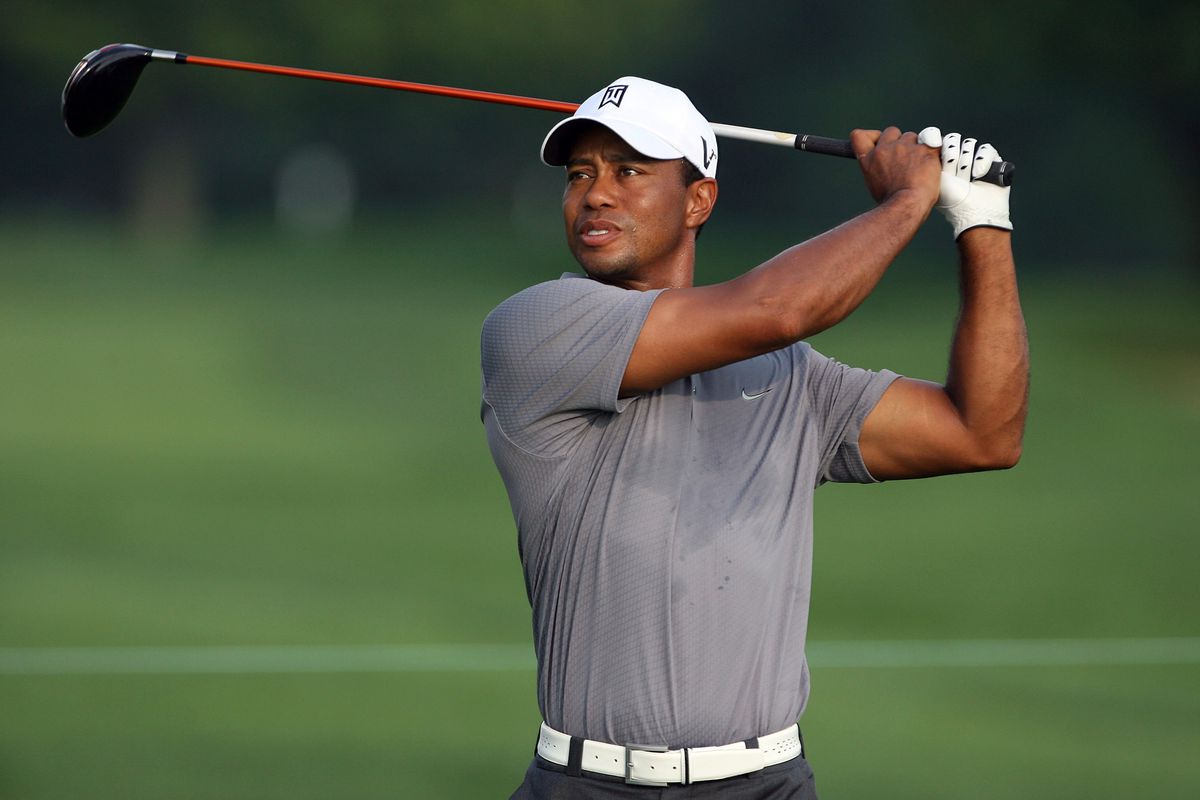 Sep 5, 2012; Carmel, IN, USA; Tiger Woods hits a tee shot during the Pro-Am before the BMW Championship at Crooked Stick Golf Club. Mandatory Credit: Brian Spurlock-US PRESSWIRE