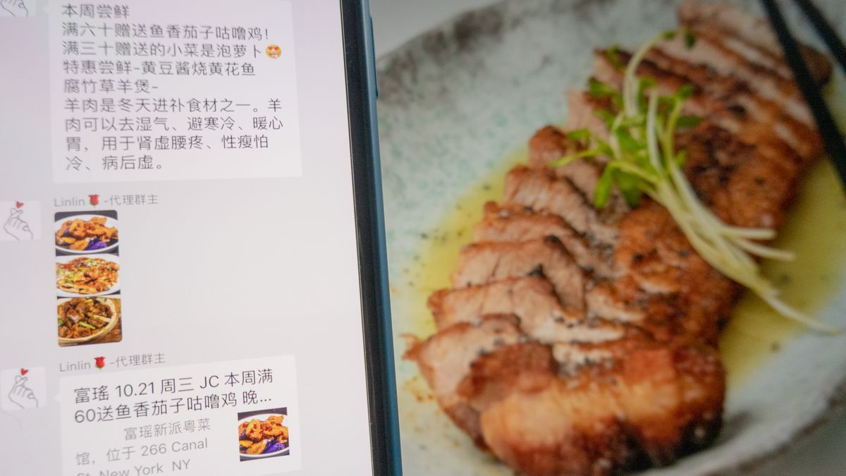 A photo of an app with chopsticks on the side and a computer screen showing food