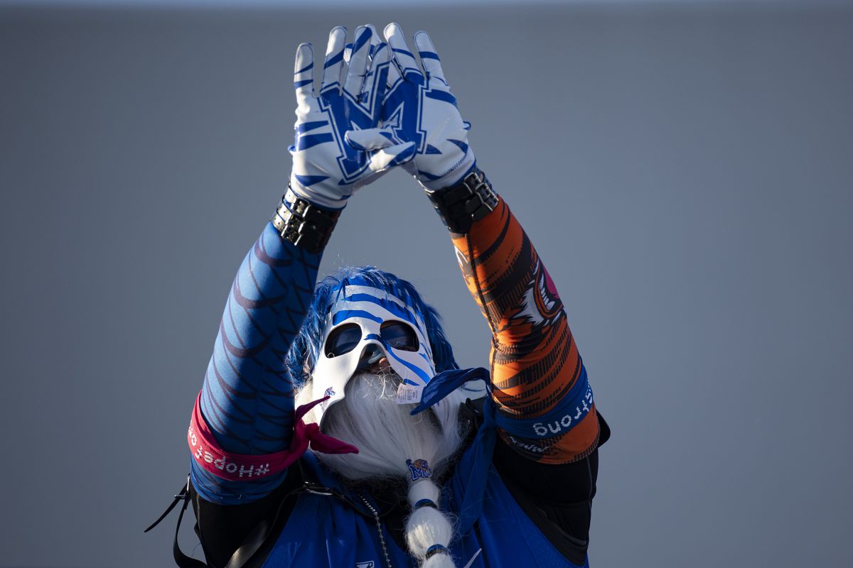 A Memphis Tigers fan cheers during warmups before the game against the Arkansas State Red Wolves at Liberty Bowl Memorial Stadium on September 5, 2020 in Memphis, Tennessee.