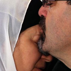 Namee Barakat hugs his wife Layla during a news conference in Raleigh, N.C., about the death of his son, Deah, his daughter-in-law and her sister on Wednesday, Feb. 11, 2015. Barakat said the death penalty “would not be enough” for Craig Hicks, the man charged with murdering the three Muslim students. 
