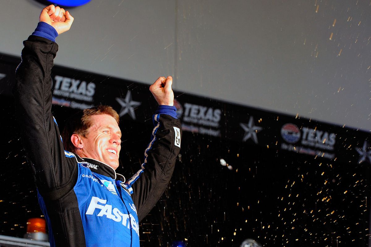 Carl Edwards celebrates in victory lane after winning the NASCAR Nationwide Series O'Reilly Auto Parts 300 at Texas Motor Speedway.