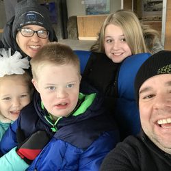 Emily and Cody Craynor pose for a selfie with their kids, Caylee, 6, Mikey, 16, and McKenzie, 12.