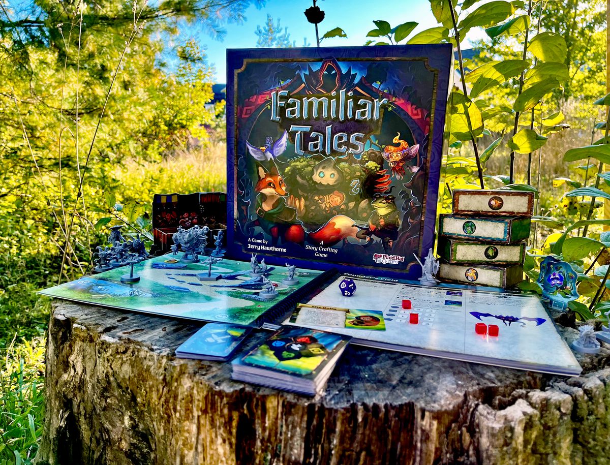 A complete setup for Familiar Tales on a tree stump.