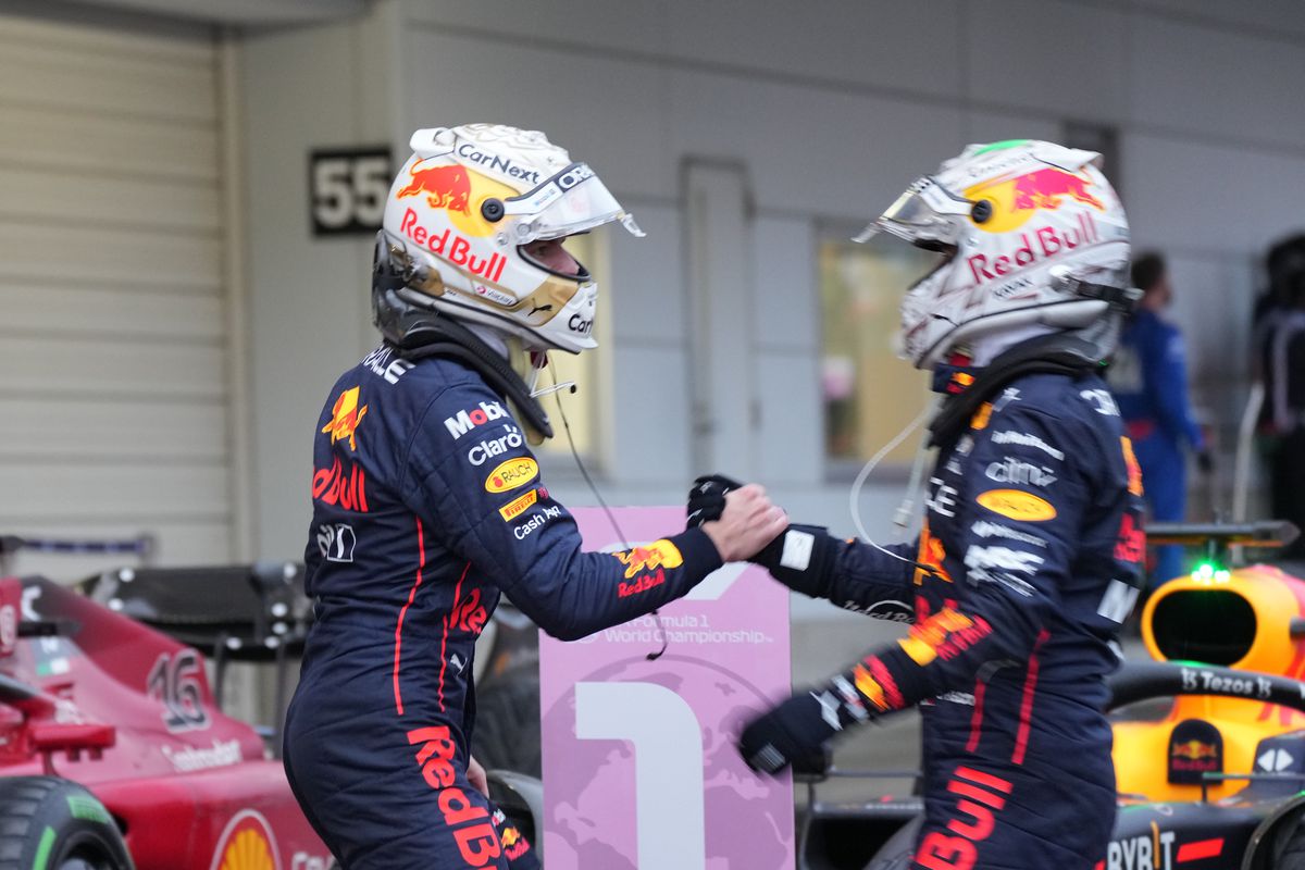 &nbsp;Red Bull Racing’s Dutch driver Max Verstappen L celebrates with teammate Mexican driver Sergio Perez during the race of the Formula One Japan Grand Prix held at the Suzuka Circuit in Suzuka City, Japan, Oct. 9, 2022.