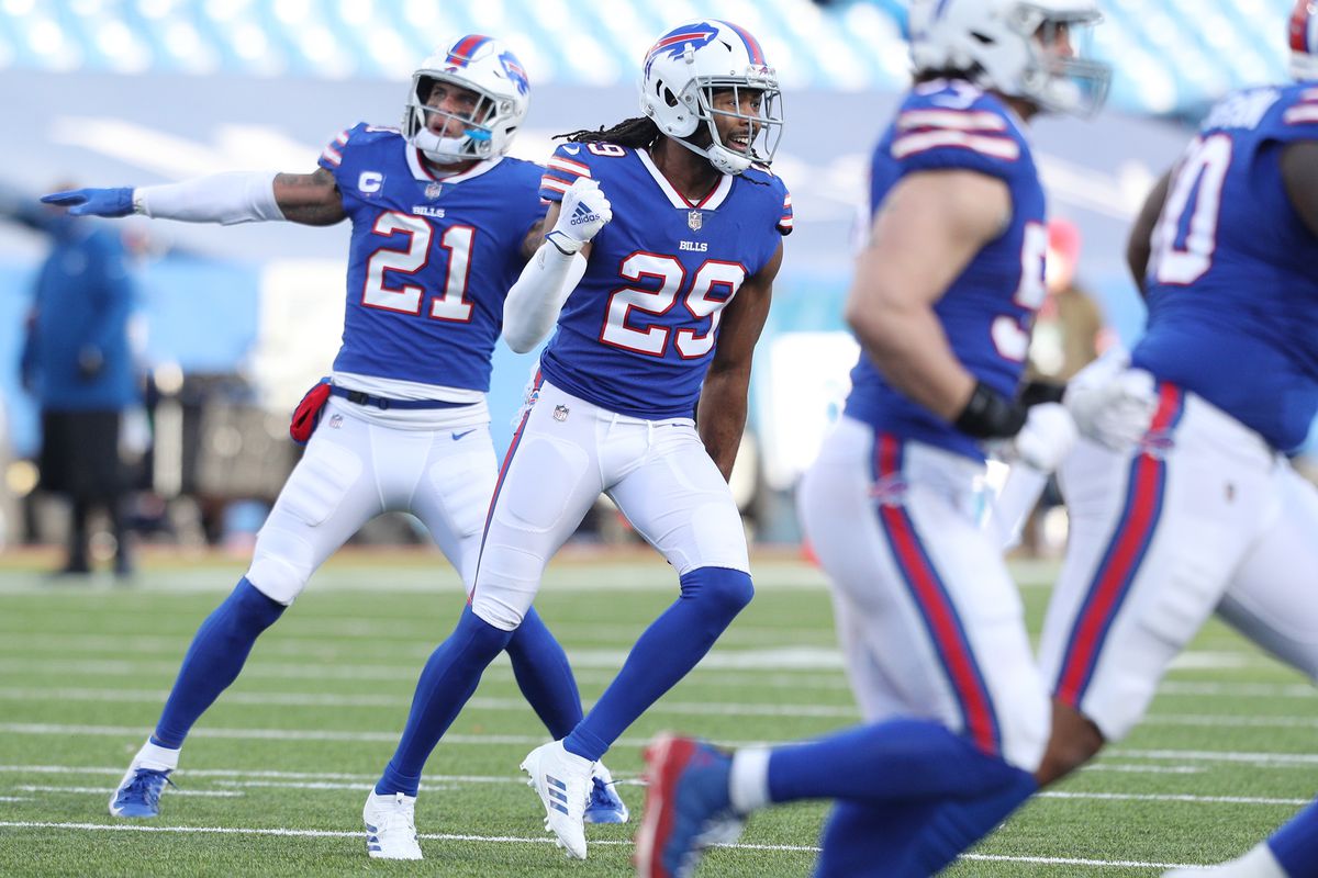 Josh Norman #29 and Jordan Poyer #21 of the Buffalo Bills celebrate after Rodrigo Blankenship #3 of the Indianapolis Colts (not pictured) misses a field goal during the second half of the AFC Wild Card playoff game at Bills Stadium on January 09, 2021 in Orchard Park, New York.