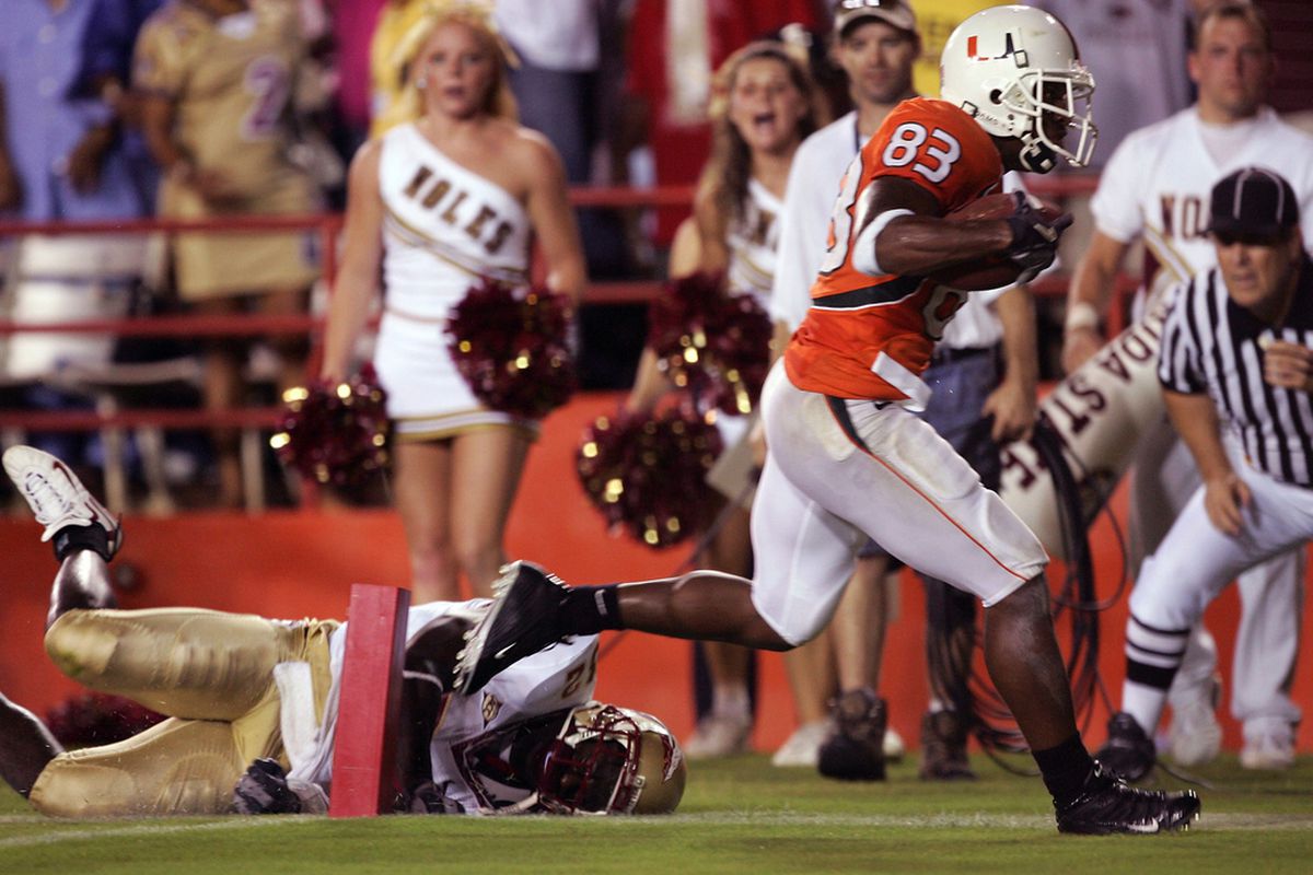 Sinorice Moss of No. 5 Miami scores the touchdown that took No. 4 Florida State to overtime in 2004.
