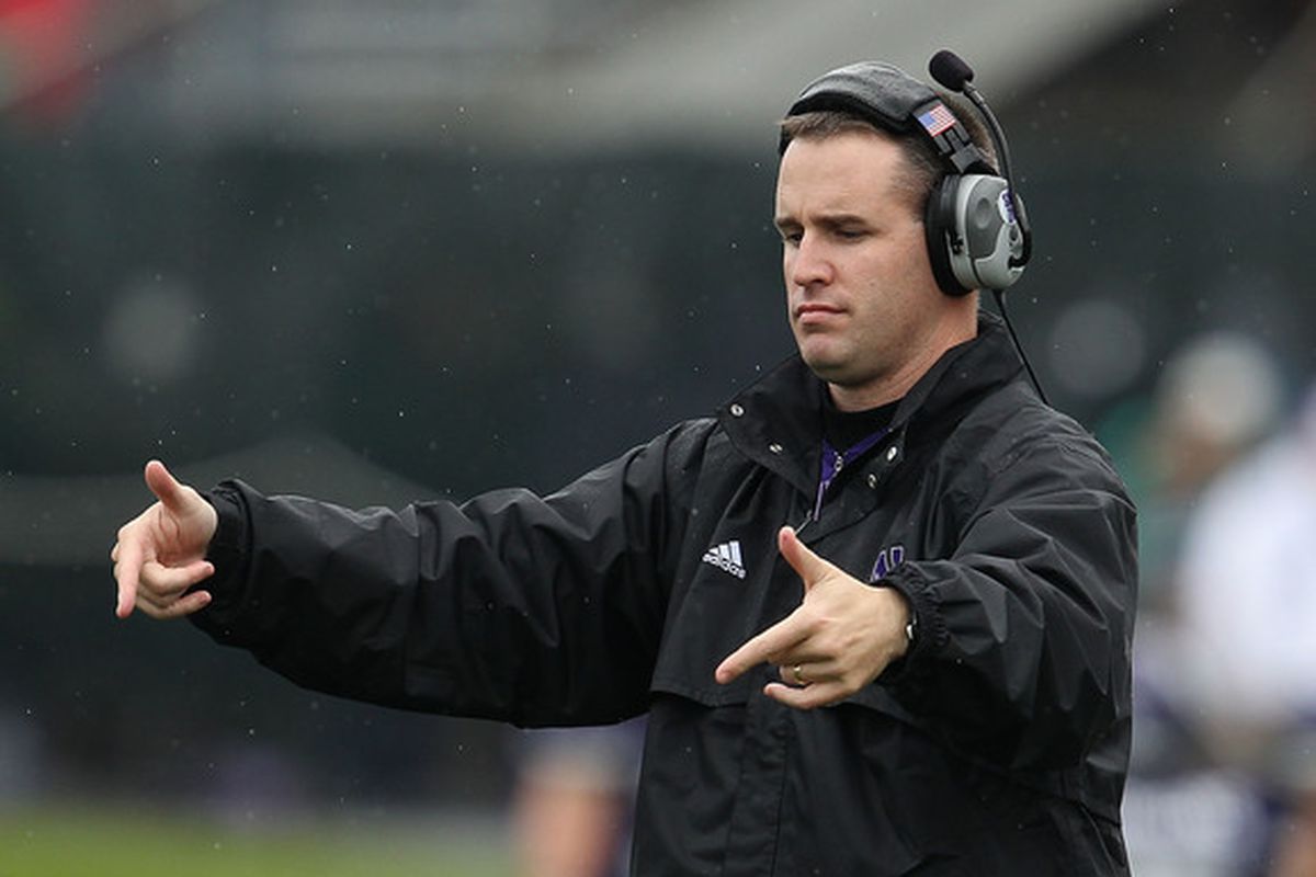 Pat Fitzgerald makes a not-so-subtle gesture to all the ladies in the stands. 
