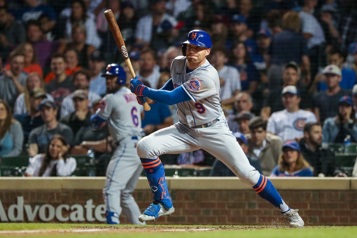 Brandon Nimmo #9 of the New York Mets hits a ground ball in the seventh inning during game two of a doubleheader between the New York Mets and the Chicago Cubs at Wrigley Field