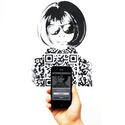 Yiying Lu, the artist who came up with Twiter's Fail Whale, made this techie portrait of Anna. If you scanned the barcode with your iPhone, you got directed to a site where you could download the art.