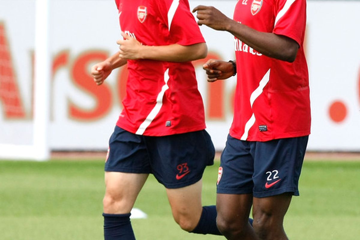 ST ALBANS, ENGLAND - AUGUST 05: Gervinho (R) and Ryo Miyaichi (L) of Arsenal during a training session at London Colney on August 5, 2011 in St Albans, England. (Photo by Tom Dulat/Getty Images)