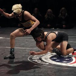Students Tanner Cox of Maple Mountain and Corbin Smith of Wasatch compete at the 4A state wrestling championships at UVU in Orem Thursday, Feb. 12, 2015.