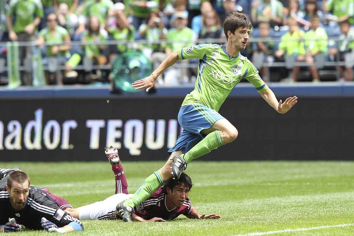 SEATTLE - JULY 16:  Alvaro Fernandez #15 of the Seattle Sounders FC watches his first half goal sail into the net against the Colorado Rapids at CenturyLink Field on July 16, 2011 in Seattle, Washington. (Photo by Otto Greule Jr/Getty Images)