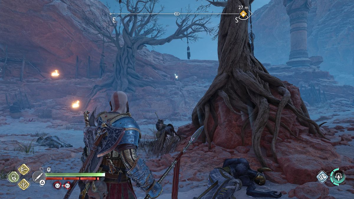 Kratos looks at a Nornir Chest Totem
