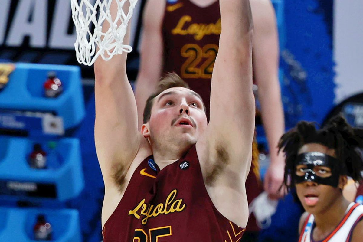 Loyola Ramblers center Cameron Krutwig shoots against the Illinois Fighting Illini during the second half in the second round of the 2021 NCAA Tournament at Bankers Life Fieldhouse.