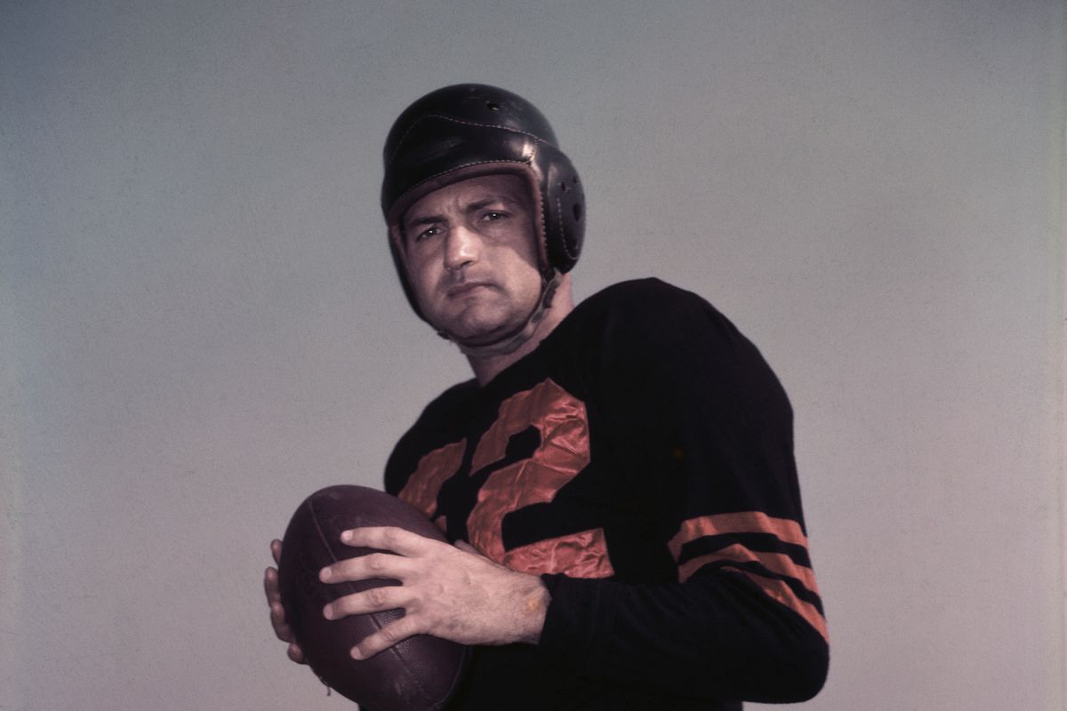 Sid Luckman with Football in Hand