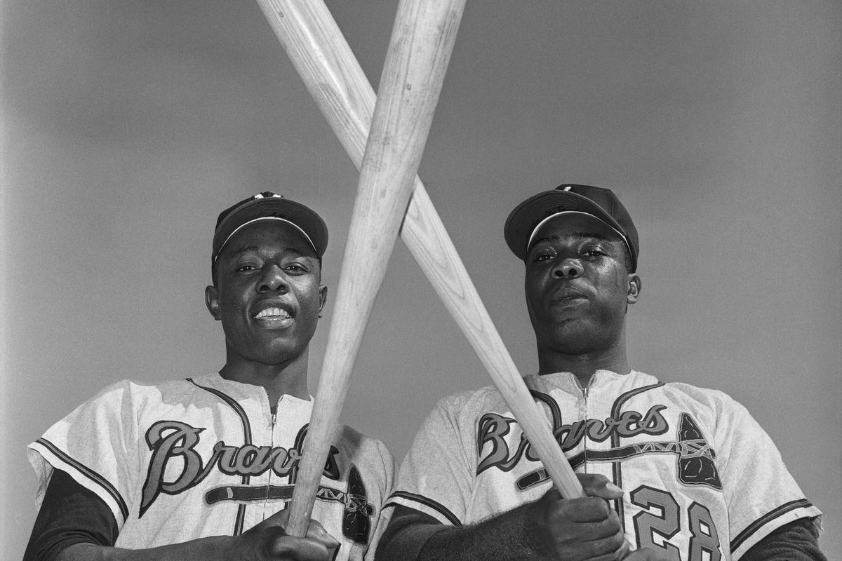 Hank Aaron and Brother Tommy Aaron Crossing Bats