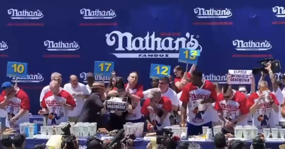 Joey Chestnut choked out a protester whereas successful the recent canine consuming contest [VIDEO]