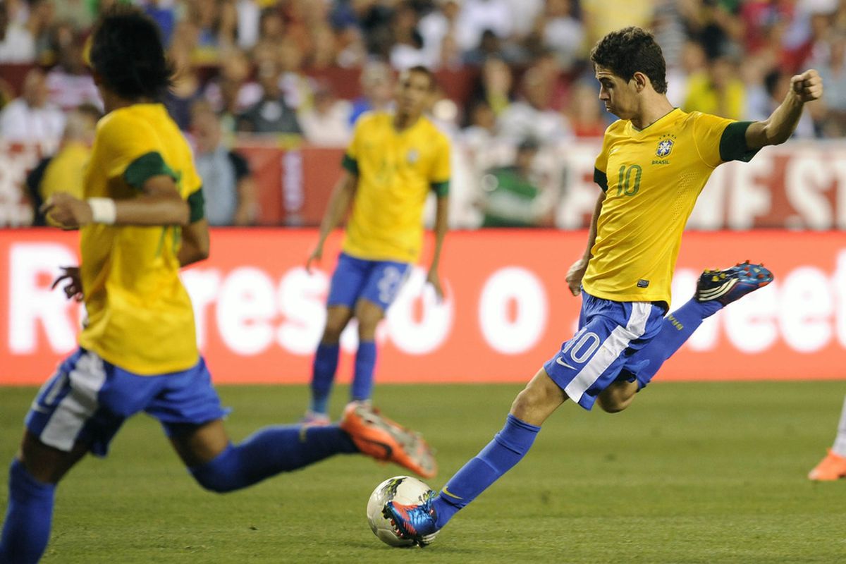 May 30, 2012; Landover, MD, USA; Brazil midfielder Oscar (10) attempts a shot on goal against the USA during the second half of a men's international friendly match at FedEx Field.  Mandatory Credit: Rafael Suanes-US PRESSWIRE