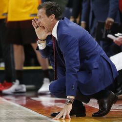 Utah Jazz coach Quin Snyder shouts to his team during the second half of an NBA basketball game against the Sacramento Kings on Saturday, March 17, 2018, in Salt Lake City. (AP Photo/Rick Bowmer)