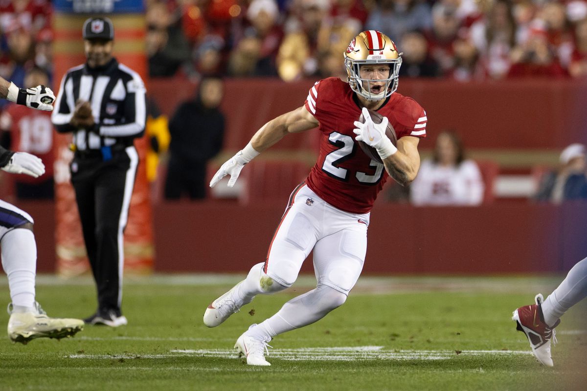 Christian McCaffrey #23 of the San Francisco 49ers rushes during the game against the Baltimore Ravens at Levi’s Stadium on December 25, 2023 in Santa Clara, California. The Ravens defeated the 49ers 33-19.