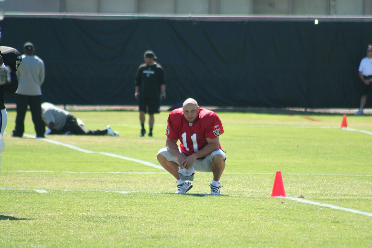 Raiders kicker Sebastian Janikowski sits alone at training camp (photo by Levi Damien)