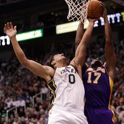 Utah Jazz forward Enes Kanter (0) and Los Angeles Lakers center Andrew Bynum (17) fight for the rebound in Salt Lake City  Saturday, Feb. 4, 2012. 