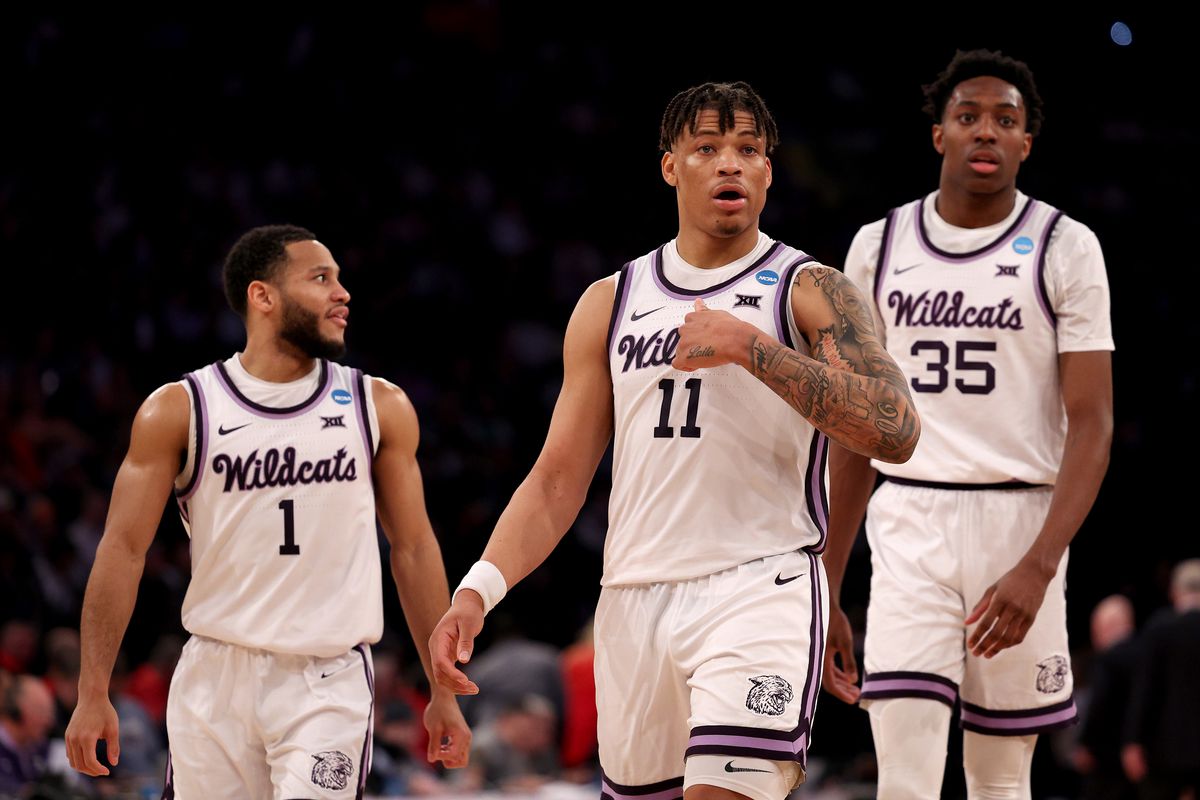 Markquis Nowell #1, Keyontae Johnson #11 and Nae’Qwan Tomlin #35 of the Kansas State Wildcats react against the Michigan State Spartans during the second half in the Sweet 16 round game of the NCAA Men’s Basketball Tournament at Madison Square Garden on March 23, 2023 in New York City.