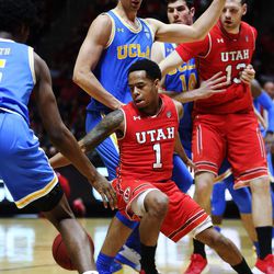 Utah Utes guard Justin Bibbins (1) dribble through a UCLA defense in Salt Lake City on Thursday, Feb. 22, 2018. Utah won 84-78.