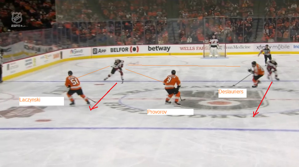 Mercer gets the puck as he enters the neutral zone.