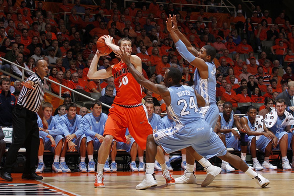 Justin Watts and Leslie McDonald defend against Bill Cole of the Illinois Fighting Illini during the 2010 ACC/Big Ten Challenge.