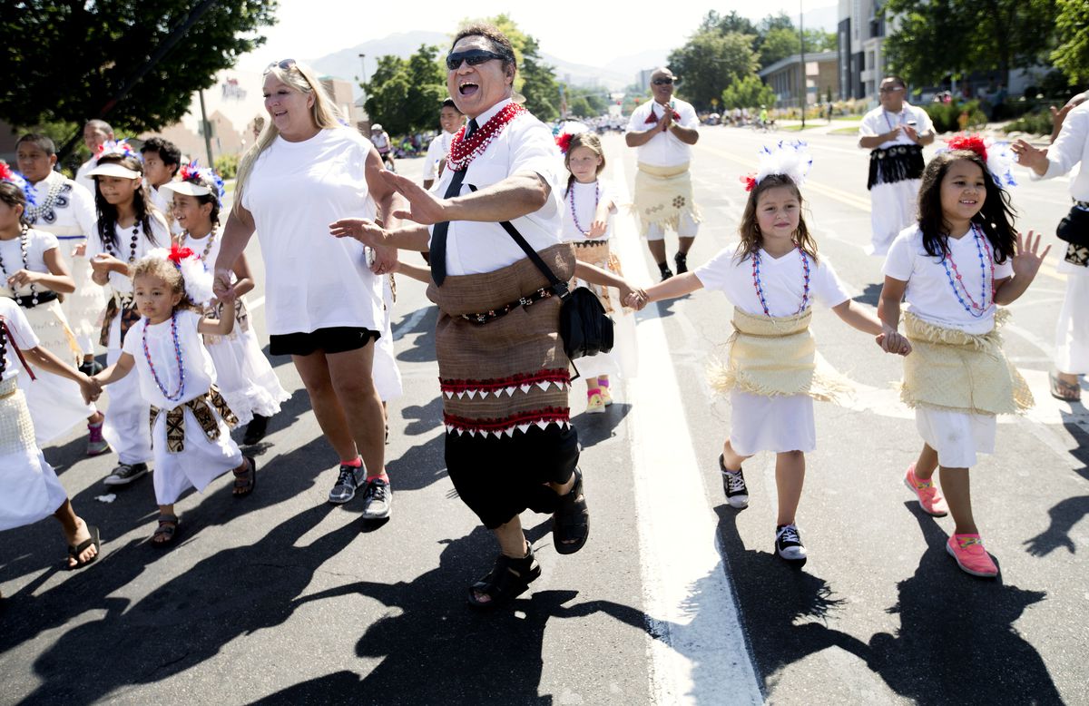 Members of the Fonua/Kioa family march in the Days of '47 Youth Parade in Salt Lake City on Saturday, July 22, 2017.