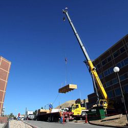 Components for a new intraoperative MRI system are moved into the University of Utah Clinical Neurosciences Center in Salt Lake City, Tuesday, Oct. 2, 2012.