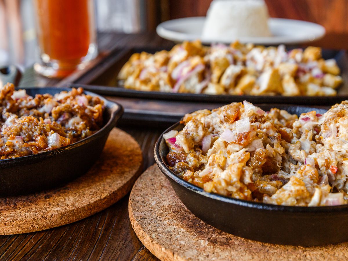 Sizzling sisig comes in a cast iron skillet.
