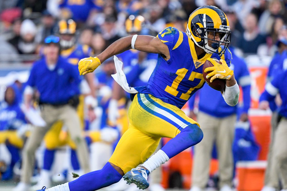 Los Angeles Rams wide receiver Robert Woods heads upfield with a pass during the fourth quarter against the Arizona Cardinals at Los Angeles Memorial Coliseum.