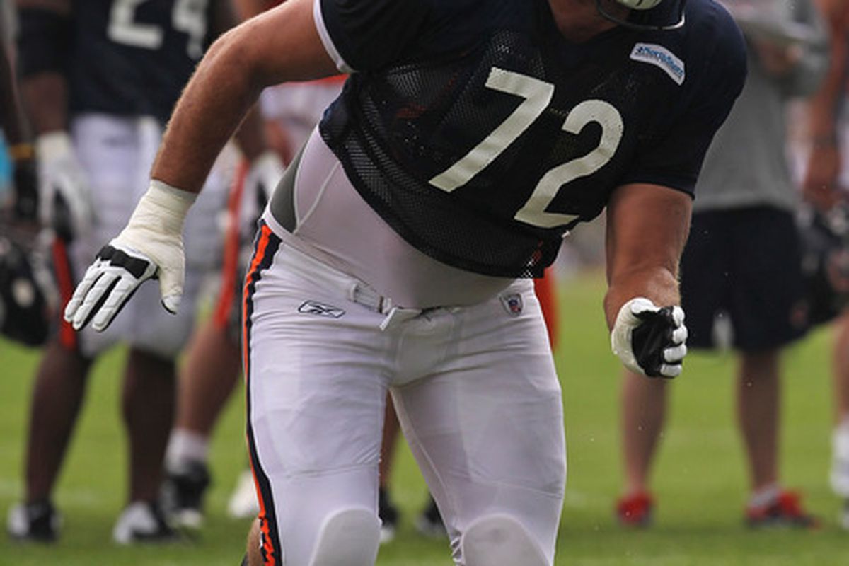 BOURBONNAIS, IL - AUGUST 06: Gabe Carimi #72 (Wisconsin) of the Chicago Bears rolls out to block during a summer training camp practice at Olivet Nazarene University on August 6, 2011 in Bourbonnais, Illinois. (Photo by Jonathan Daniel/Getty Images)