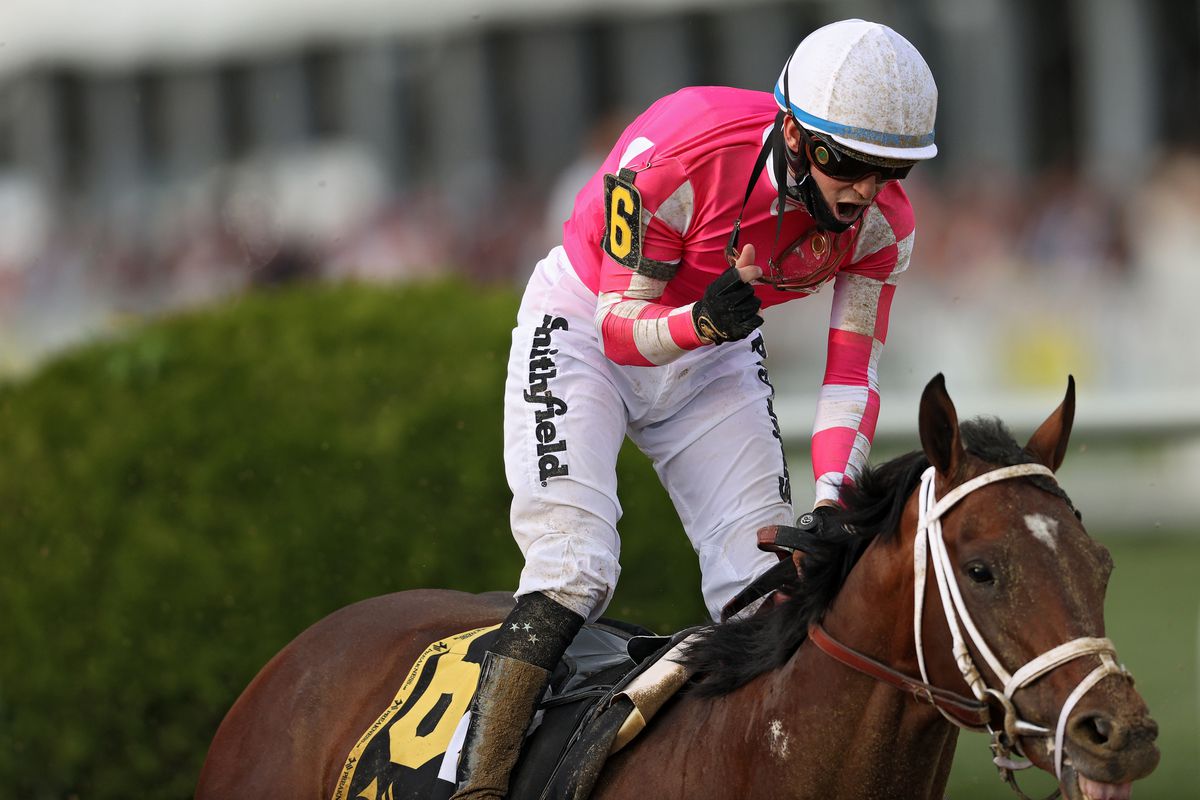 Jockey Flavien Prat riding Rombauer celebrates as he wins the 146th Running of the Preakness Stakes at Pimlico Race Course on May 15, 2021 in Baltimore, Maryland.
