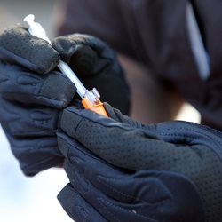 Utah Highway Patrol trooper Jeff Blankenagel finds drug paraphernalia during a vehicle search as part of Operation Rio Grande in Salt Lake City on Tuesday, Aug. 15, 2017.